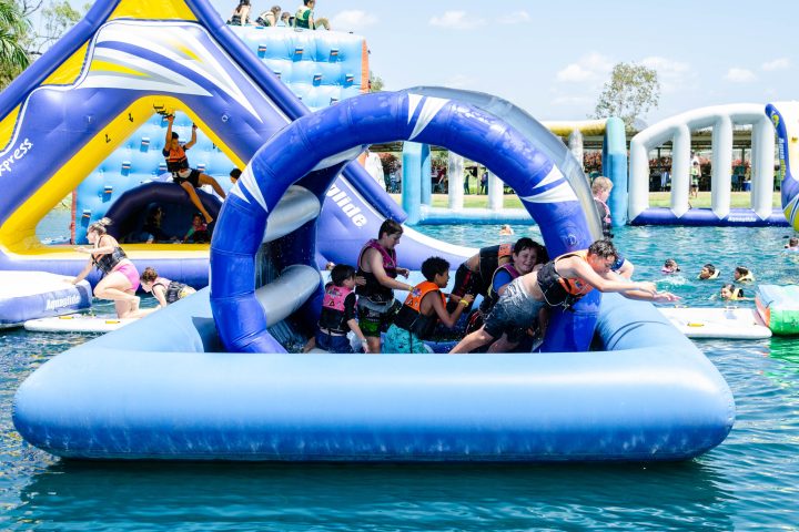 a person in a blue pool of water