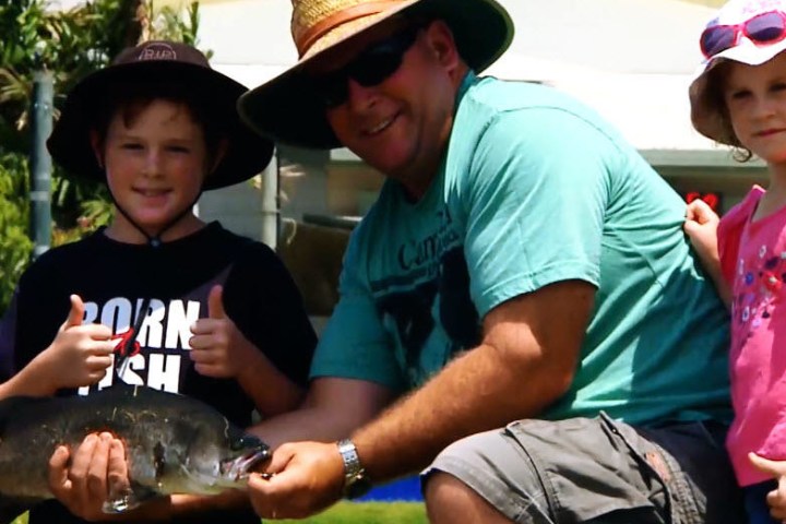 family doing fishing activity