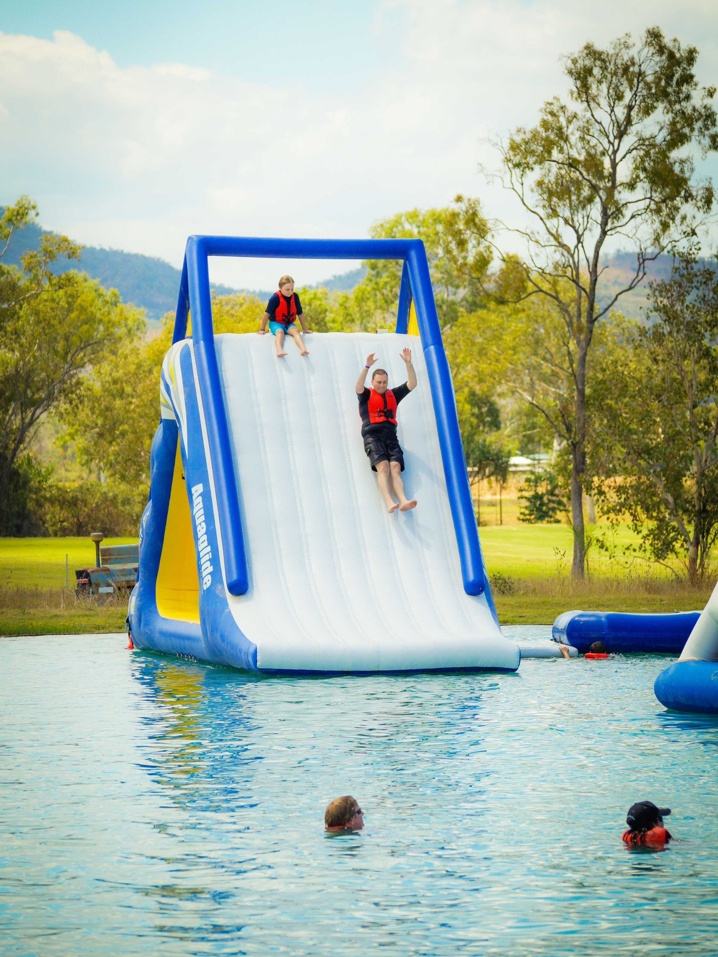 people enjoying the waterpark and slides
