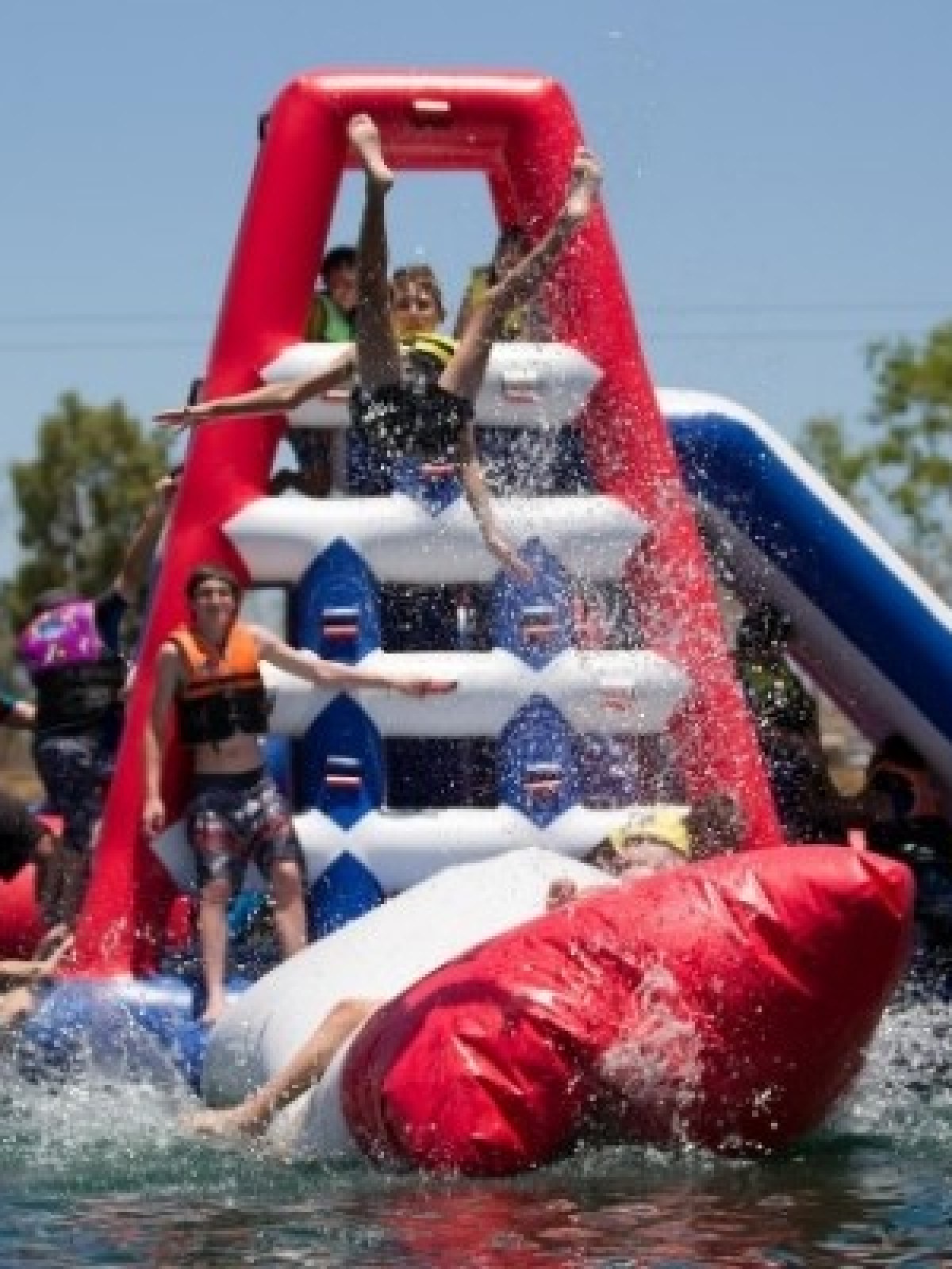 a group of people riding on the back of a boat