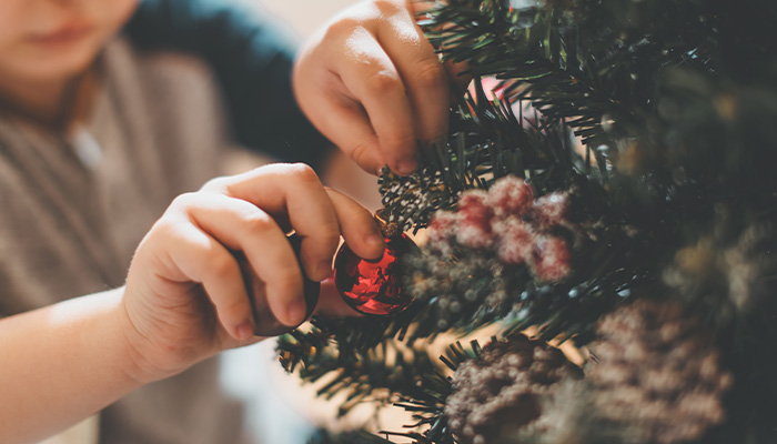 a hand holding a flower