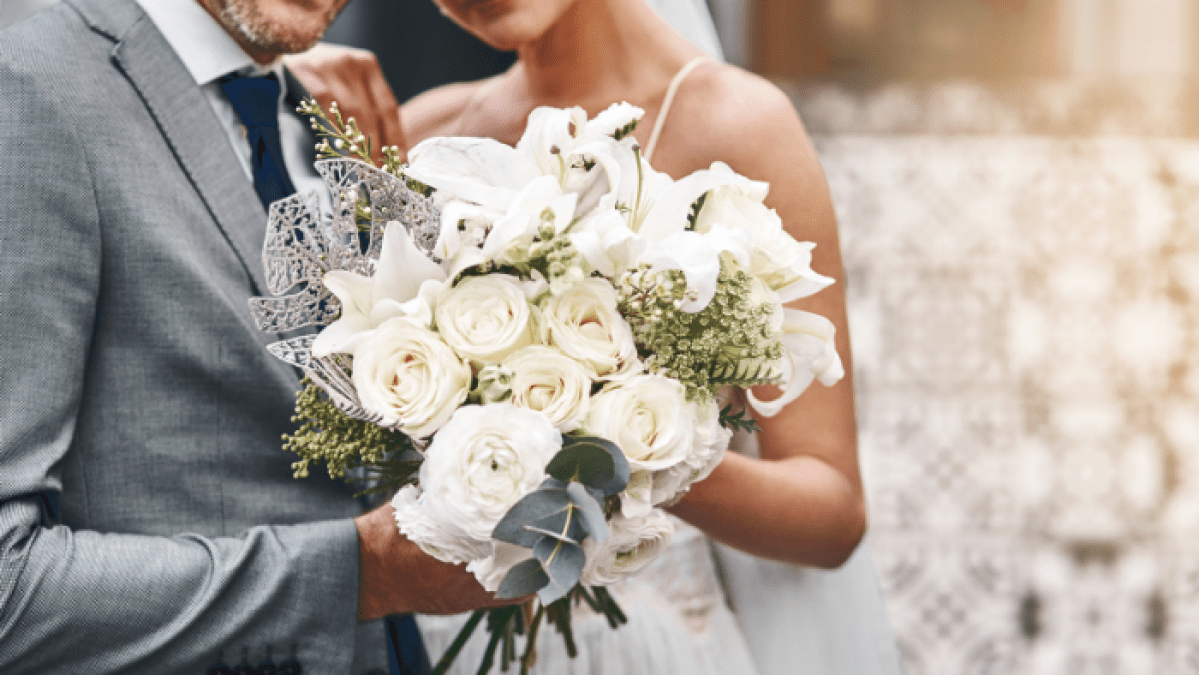 a person holding a flower