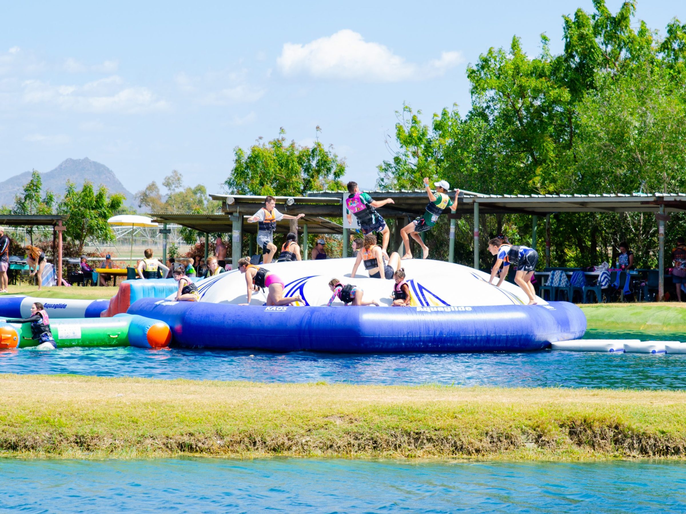 a group of people on a boat in the water